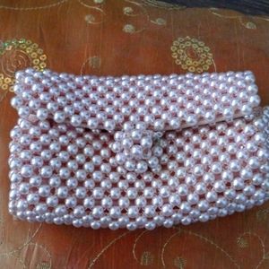 Vintage 1950s Light pink beaded pearl style elegant small bag.